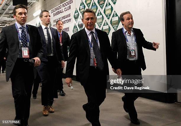 Detroit Red Wings general manager Ken Holland and television broadcaster Ken Daniels arrive for the 2016 Coors Light Stadium Series game between the...