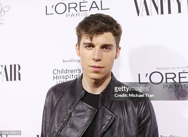 Nolan Gerard Funk arrives at the Vanity Fair pre-Oscar party held at Palihouse Holloway on February 26, 2016 in West Hollywood, California.