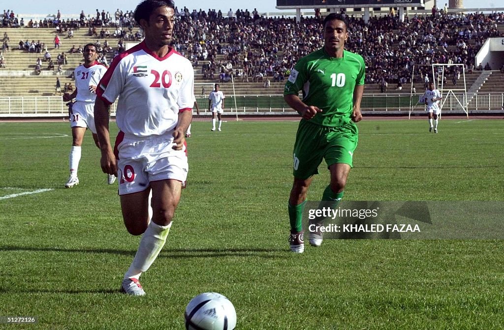 Al Rashdi Ali Rashed Mohammed Rashed UAE player Ali Msarri Rashed is chased by Yemeni player Ali Mohammed ...