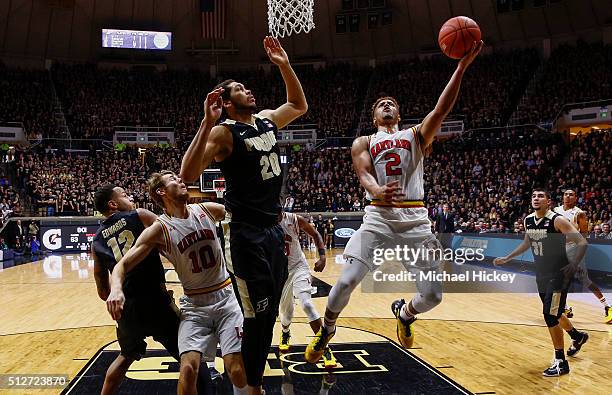 Melo Trimble of the Maryland Terrapins shoots the ball against A.J. Hammons of the Purdue Boilermakers at Mackey Arena on February 27, 2016 in West...