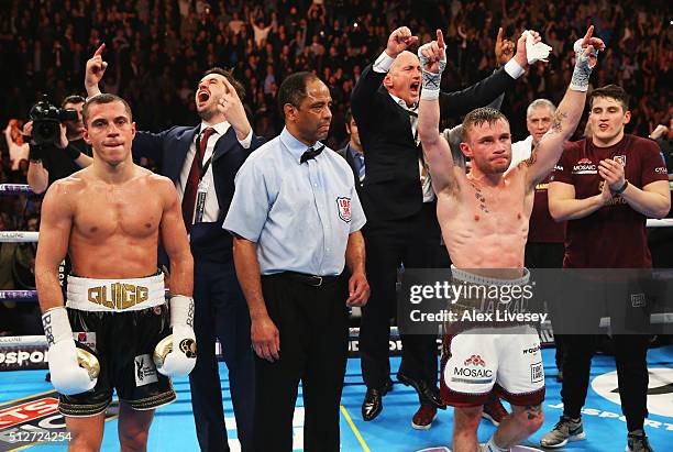 Carl Frampton celebrates a points victory over Scott Quigg as his manager Barry McGuigan reacts after their World Super-Bantamweight title contest at...