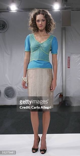 Model stands on a runway at the Perry Ellis Show during Olympus Fashion Week Spring 2005 in the Theater at Bryant Park September 8, 2004 in New York...