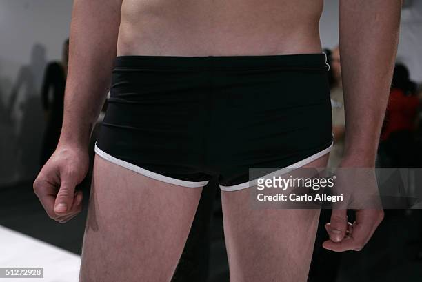 Model stands on a runway at the Perry Ellis Show during Olympus Fashion Week Spring 2005 at Bryant Park September 8, 2004 in New York City.