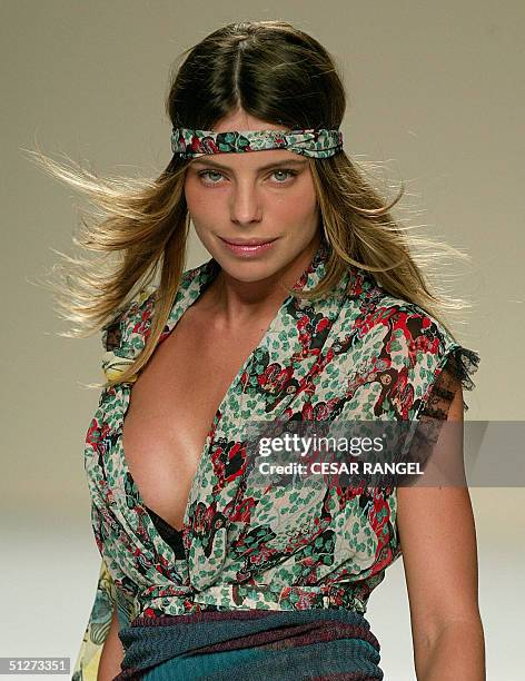 Model Daniella Ciccarelli, girlfriend of Brazilian superstar Ronaldo, wears a creation by Brazilian designer Tereza Santos, during the Spring-Summer...