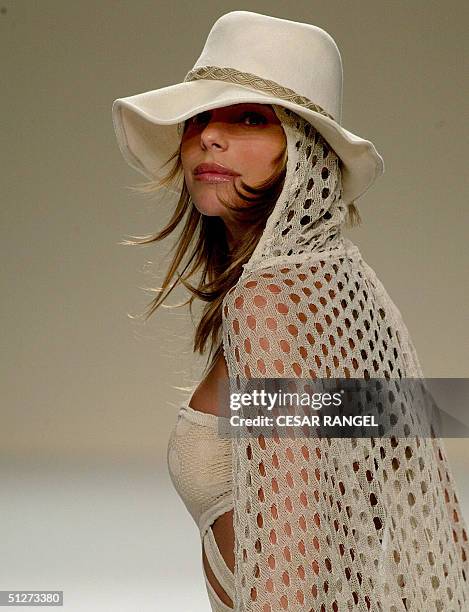 Model Daniella Ciccarelli, girlfriend of Brazilian superstar Ronaldo, wears a creation by Brazilian designer Tereza Santos, during the Spring-Summer...