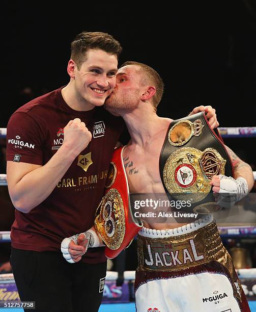 Carl Frampton kisses trainer Shane McGuigan in celebration after a points victory over Scott Quigg after the World Super-Bantamweight title contest...