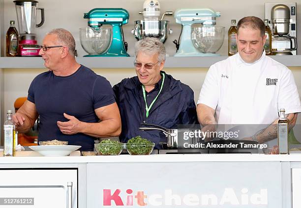 Chef Robert Irvine leads a culinary demonstration and is joined by Marc Summers and Darryl Moiles at Goya Foods Grand Tasting Village Featuring...