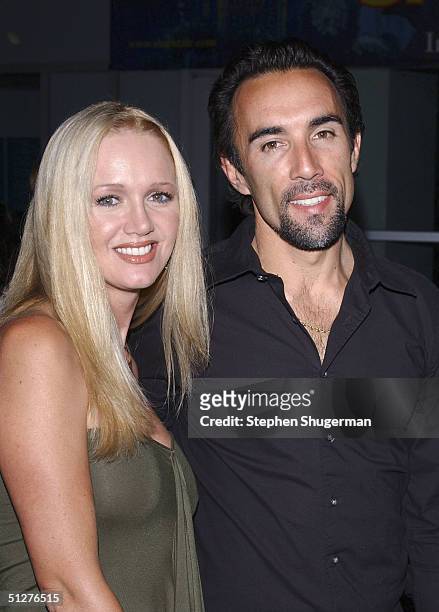 Actor Francesco Quinn and his wife Julie attend the premiere of "VLAD" at the Arclight Theater on September 8, 2004 in Hollywood, California.