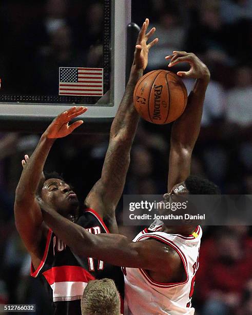 Ed Davis of the Portland Trail Blazers blocks a shot by Bobby Portis of the Chicago Bulls at the United Center on February 27, 2016 in Chicago,...