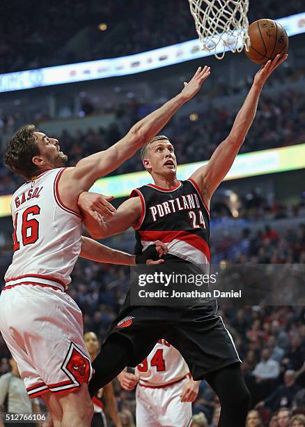 Mason Plumlee of the Portland Trail Blazers puts up a shot against Pau Gasol of the Chicago Bulls at the United Center on February 27, 2016 in...