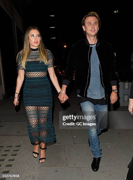 Anat Popovsky and Jonathan Cheban arrive at Tape night club hand in hand on February 27, 2016 in London, England.