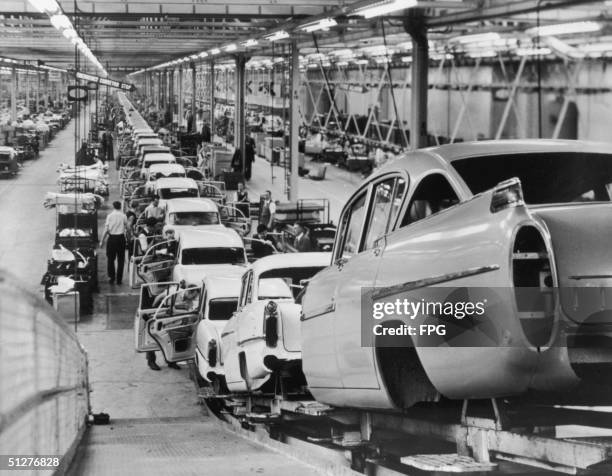 The production line at the Vauxhall car plant at Luton, Bedfordshire, 1959.