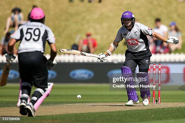 Tom Latham of South Island makes a call while batting during the Island of Origin Twenty20 at Basin Reserve on February 28, 2016 in Wellington, New...