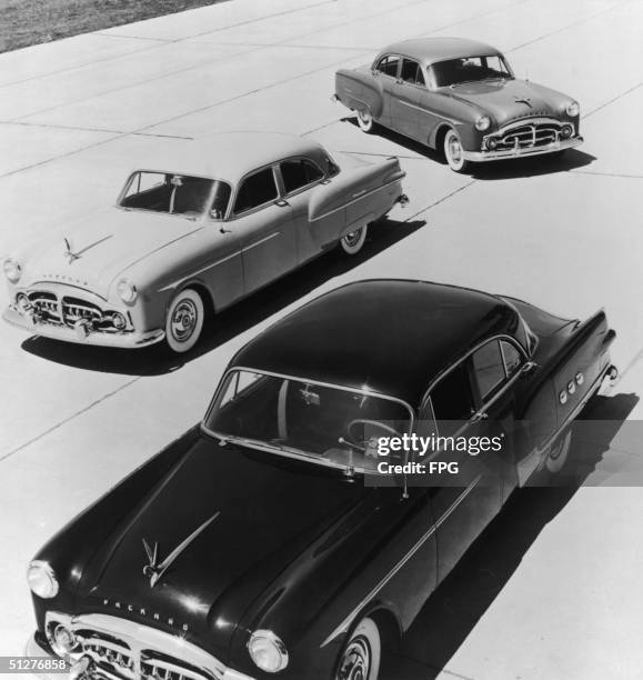 Three 1951 Packard Sedans.