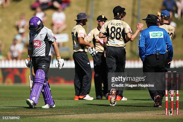 Tom Latham of South Island leaves the field after being dismissed during the Island of Origin Twenty20 at Basin Reserve on February 28, 2016 in...