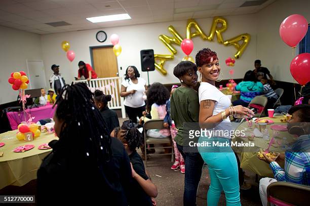 Center to right, Quinn Felder and Kiara Brown joined friends and families from the local community at a birthday party for a 4 year old girl, A'nara,...
