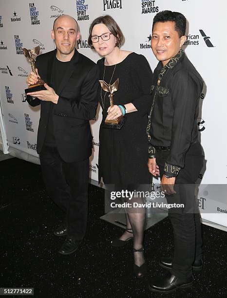 Director Joshua Oppenheimer , producer Signe Byrge Sorensen , winner of the Best Documentary award for 'The Look of Silence,' pose with Adi Rukun...