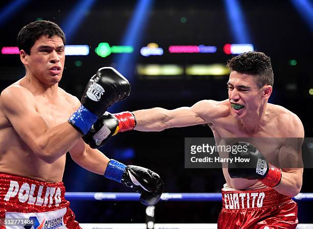 Hugo Ruiz knocks down Julio Ceja to win the WBC Super Bantamweight title with a first round TKO at Honda Center on February 27, 2016 in Anaheim,...