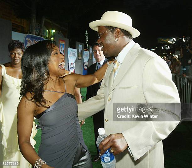 Actors Angela Bassett and Bernie Mac arrive at the premiere of Touchstone Pictures' "Mr. 3000" at the El Capitan Theatre on September 8, 2004 in Los...