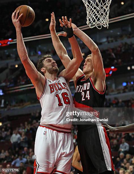 Pau Gasol of the Chicago Bulls puts up a shot against Mason Plumlee of the Portland Trail Blazers on his way to his 8th career triple double at the...