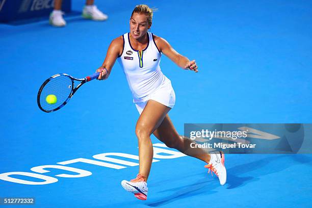 Dominika Cibulkova of Slovakia returns the ball during the woman's final singles match between Dominika Cibulkova of Slovakia and Sloane Stephens of...