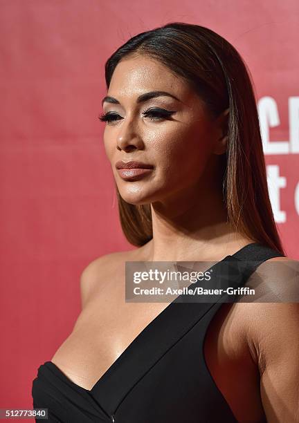 Singer Nicole Scherzinger arrives at the 2016 MusiCares Person of the Year honoring Lionel Richie at Los Angeles Convention Center on February 13,...