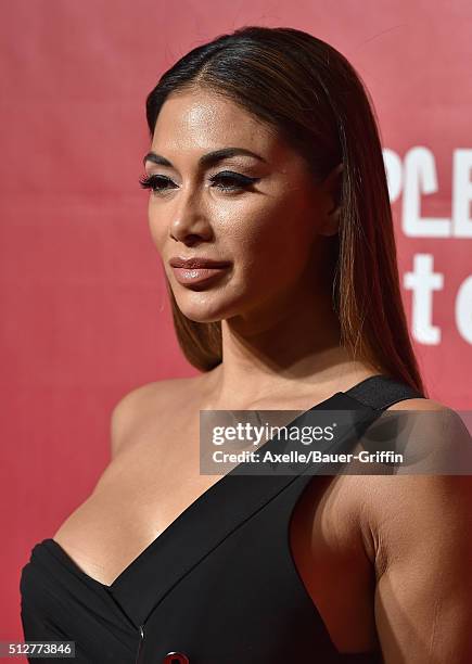 Singer Nicole Scherzinger arrives at the 2016 MusiCares Person of the Year honoring Lionel Richie at Los Angeles Convention Center on February 13,...