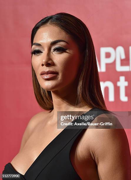 Singer Nicole Scherzinger arrives at the 2016 MusiCares Person of the Year honoring Lionel Richie at Los Angeles Convention Center on February 13,...