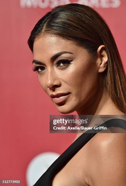 Singer Nicole Scherzinger arrives at the 2016 MusiCares Person of the Year honoring Lionel Richie at Los Angeles Convention Center on February 13,...