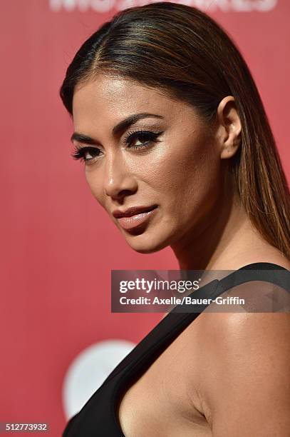 Singer Nicole Scherzinger arrives at the 2016 MusiCares Person of the Year honoring Lionel Richie at Los Angeles Convention Center on February 13,...