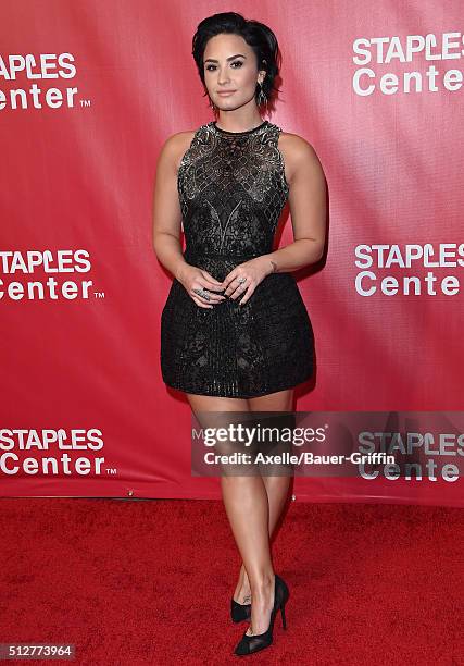 Singer Demi Lovato arrives at the 2016 MusiCares Person of the Year honoring Lionel Richie at Los Angeles Convention Center on February 13, 2016 in...