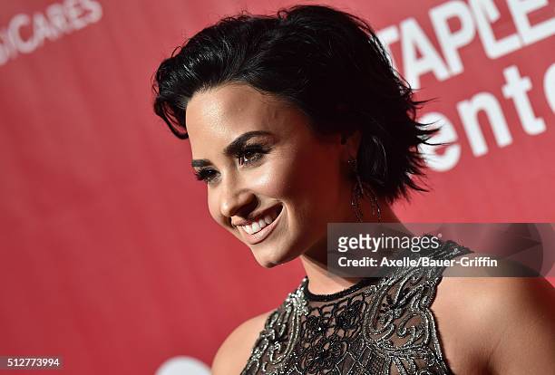 Singer Demi Lovato arrives at the 2016 MusiCares Person of the Year honoring Lionel Richie at Los Angeles Convention Center on February 13, 2016 in...