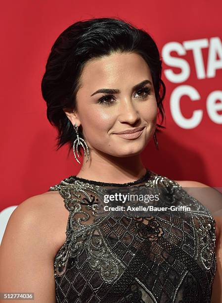 Singer Demi Lovato arrives at the 2016 MusiCares Person of the Year honoring Lionel Richie at Los Angeles Convention Center on February 13, 2016 in...