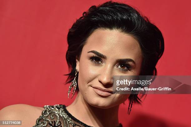 Singer Demi Lovato arrives at the 2016 MusiCares Person of the Year honoring Lionel Richie at Los Angeles Convention Center on February 13, 2016 in...