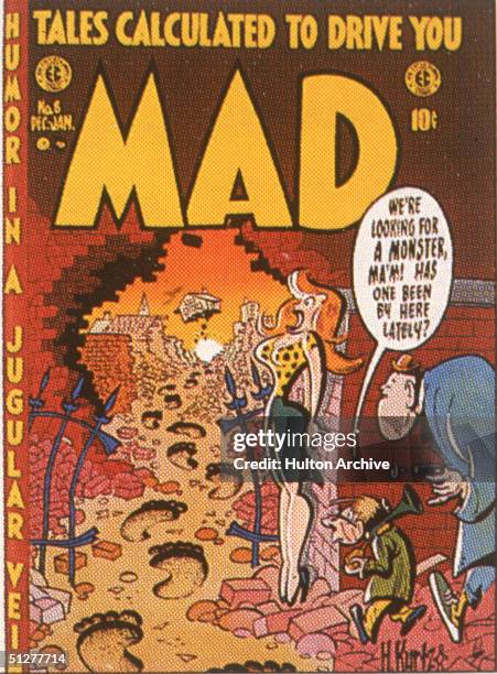 The cover of issue of Mad magazine shows a cartoon by Harvey Kurtzman of two men as they follow oversized footprints through a hole in a brick wall...