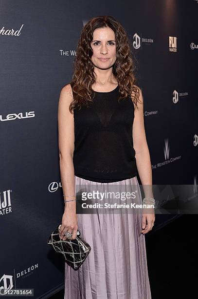 Producer Livia Giuggioli attends The Weinstein Company's Pre-Oscar Dinner presented in partnership with FIJI Water, Chopard, DeLeon, and Lexus at the...