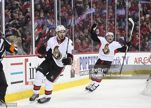 Mika Zibanejad of the Ottawa Senators celebrates his hat trick goal in the third period with Mike Hoffman during their NHL game against the Calgary...
