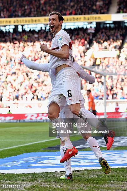 Georg Niedermeier of VfB Stuttgart celebrates as Timo Werner scores the opening goal during the Bundesliga match between VfB Stuttgart and Hannover...