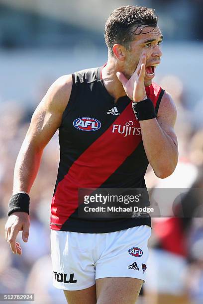 Ryan Crowley of the Bombers shouts to a teammate to centre the ball during the 2016 AFL NAB Challenge match between Carlton and Essendon at Ikon Park...