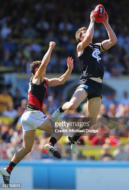 Sam Rowe of the Blues marks the ball during the 2016 AFL NAB Challenge match between Carlton and Essendon at Ikon Park on February 28, 2016 in...