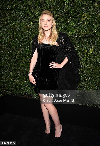 Actress Dakota Fanning attends the Charles Finch and Chanel Pre-Oscar Awards Dinner at Madeo Restaurant on February 27, 2016 in Los Angeles,...