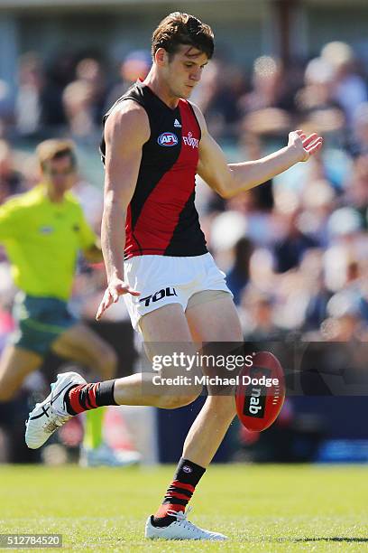 Sam Grimley of the Bombers kicks the ball during the 2016 AFL NAB Challenge match between Carlton and Essendon at Ikon Park on February 28, 2016 in...