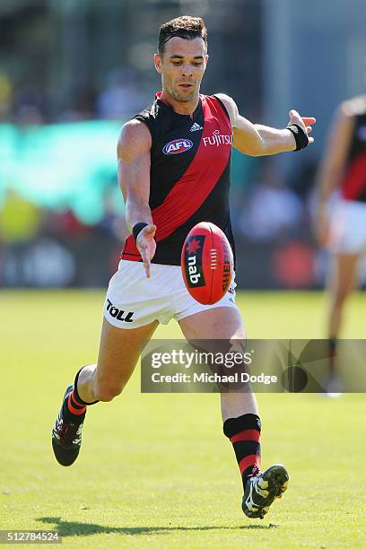 Ryan Crowley of the Bombers kicks the ball for the teams last goal after the final siren during the 2016 AFL NAB Challenge match between Carlton and...