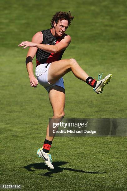 Mitch Brown of the Bombers kicks the ball during the 2016 AFL NAB Challenge match between Carlton and Essendon at Ikon Park on February 28, 2016 in...