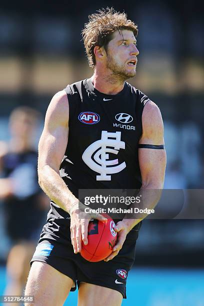 Sam Rowe of the Blues looks upfield during the 2016 AFL NAB Challenge match between Carlton and Essendon at Ikon Park on February 28, 2016 in...