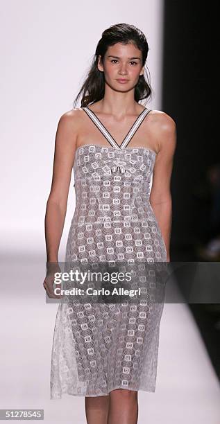Models walk down the runway at the Caroline Herrera show during Olympus Fashion Week Spring 2005 at Bryant Park September 9, 2004 in New York City.