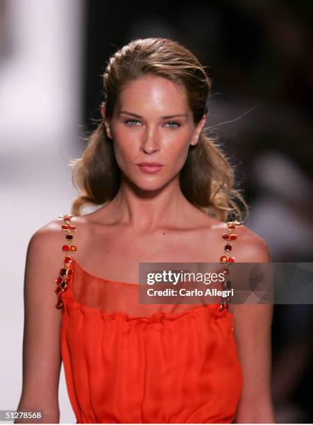 Models walk down the runway at the Caroline Herrera show during Olympus Fashion Week Spring 2005 at Bryant Park September 9, 2004 in New York City.