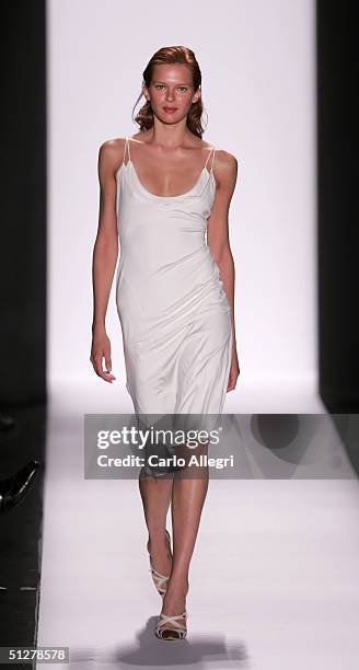 Models walk down the runway at the Caroline Herrera show during Olympus Fashion Week Spring 2005 at Bryant Park September 9, 2004 in New York City.