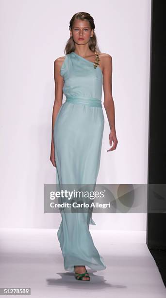 Models walk down the runway at the Caroline Herrera show during Olympus Fashion Week Spring 2005 at Bryant Park September 9, 2004 in New York City.