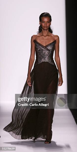 Models walk down the runway at the Caroline Herrera show during Olympus Fashion Week Spring 2005 at Bryant Park September 9, 2004 in New York City.